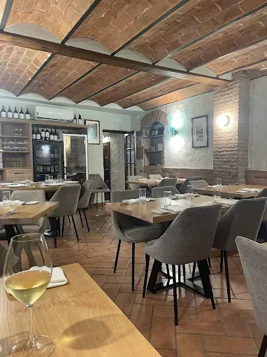 Restaurant insides, tables chairs and wine